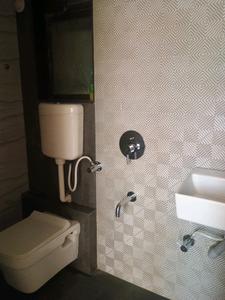 Common Bathroom Image of 654 Sq.ft 1 BHK Apartment / Flat for sale in Patel Eirene, Ambernath East Ambernath for Rs. 3500000