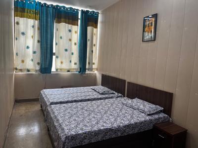 Bedroom Image of Girls PG, Arun Vihar, Contact 98189 33548 in Sector 37, Noida