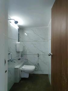 Common Bathroom Image of 625 Sq.ft 1 BHK Apartment / Flat for sale in Radha Nilaya Phase 2, Naigaon East Naigaon for Rs. 3300000