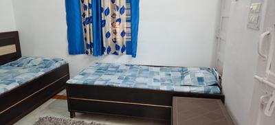 Bedroom Image of Yash PG in Moti Bagh, New Delhi