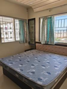 Bedroom Image of 850 Sq.ft 2 BHK Apartment / Flat for rent in Ashtavinayak City, Fursungi Pune for Rs. 22500