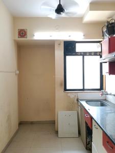 Kitchen Image of 700 Sq.ft 2 BHK Apartment / Flat for sale in Puraniks Home Town, Kasarvadavali Thane for Rs. 7600000