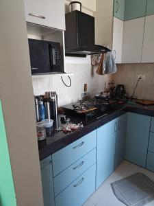 Kitchen Image of 900 Sq.ft 2 BHK Apartment / Flat for sale in Shapoorji Pallonji Joyville Sensorium, Maan Pune for Rs. 9000000