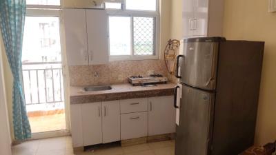 Kitchen Image of 680 Sq.ft 1 BHK Apartment / Flat for rent in UCHDPL Swamanorath, Wave City Ghaziabad for Rs. 18500