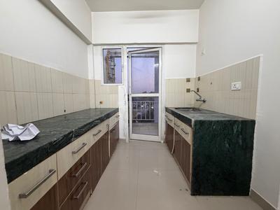 Kitchen Image of 600 Sq.ft 1 BHK Apartment / Flat for rent in Godrej Vanaangan, Jagatpur Ahmedabad for Rs. 16000