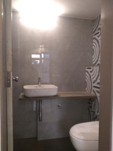Common Bathroom Image of 1385 Sq.ft 3 BHK Apartment / Flat for sale in Divine Sky Vista, Vasai West Vasai for Rs. 9400001