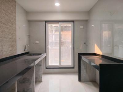 Kitchen Image of 804 Sq.ft 2 BHK Apartment / Flat for rent in Dynamix Divum, Malad East Mumbai for Rs. 75000