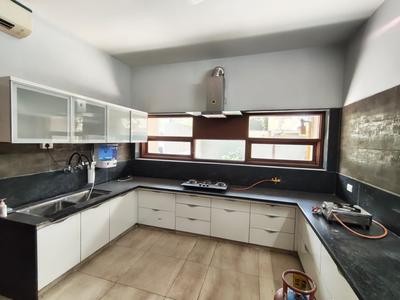 Kitchen Image of 8000 Sq.ft 5 BHK Villa for rent in Riviera Greens Row House, Shantipura Ahmedabad for Rs. 250000