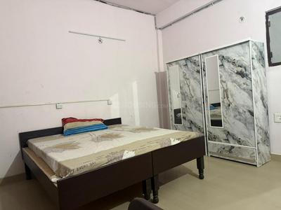 Bedroom Image of Radha Kunj PG in Sector 141, Noida