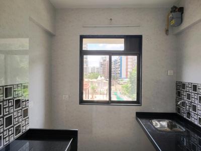 Kitchen Image of 700 Sq.ft 1 BHK Apartment / Flat for rent in Raunak Bliss, Kasarvadavali Thane for Rs. 22501