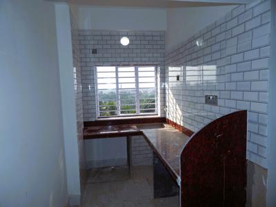 Kitchen Image of 859 Sq.ft 2 BHK Apartment / Flat for sale in Dum Dum Cantonment Kolkata for Rs. 3436000