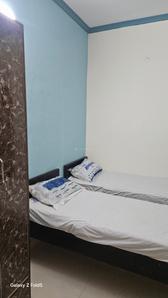 Bedroom Image of Dheeraj PG in Sector 19, Noida