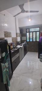 Kitchen Image of 700 Sq.ft 1 BHK Apartment / Flat for rent in Kopar Khairane Navi Mumbai for Rs. 30000