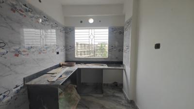 Kitchen Image of 995 Sq.ft 3 BHK Apartment / Flat for sale in New Town Kolkata for Rs. 4100000