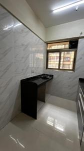 Kitchen Image of 1005 Sq.ft 2 BHK Apartment / Flat for sale in Vishesh Balaji Symphony, Panvel Navi Mumbai for Rs. 7600000
