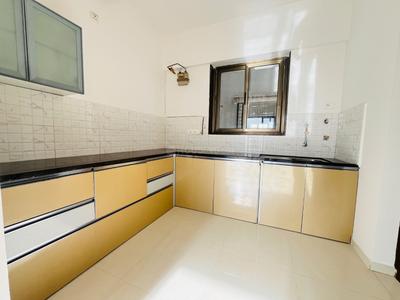 Kitchen Image of 1050 Sq.ft 2 BHK Apartment / Flat for rent in Raja Bahadur Pittie Kourtyard D Tower, Kharadi Pune for Rs. 41000