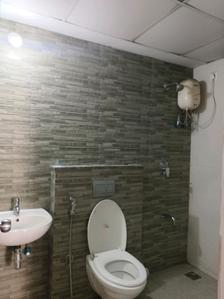 Common Bathroom Image of 550 Sq.ft 1.5 BHK Apartment / Flat for rent in Lodha Palava Downtown, Palava Phase 2 Thane for Rs. 13500