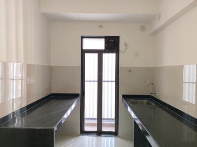Kitchen Image of 790 Sq.ft 2 BHK Apartment / Flat for rent in Runwal My City Phase II Cluster 05 Part I, Usarghar Thane for Rs. 14000
