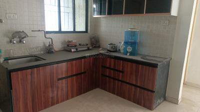 Kitchen Image of 1000 Sq.ft 2 BHK Apartment / Flat for rent in Achalare 52 Green Woods, Sus Pune for Rs. 32000
