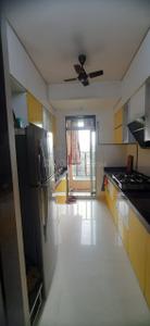 Kitchen Image of 1065 Sq.ft 2 BHK Apartment / Flat for sale in Rustomjee Urbania, Thane West Thane for Rs. 15100000
