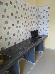 Kitchen Image of 600 Sq.ft 2 BHK Apartment / Flat for sale in Qualcon Greenwood Estate Phase 2, Hedutane Navi Mumbai for Rs. 4200000