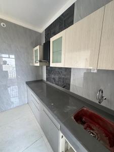 Kitchen Image of 680 Sq.ft 1 BHK Apartment / Flat for sale in Triveni Crown, Kalyan West Kalyan for Rs. 4299000