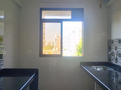 Kitchen Image of 646 Sq.ft 1 BHK Apartment / Flat for sale in Balaji Saras Residency Phase 2, Thakurli Thane for Rs. 4060000