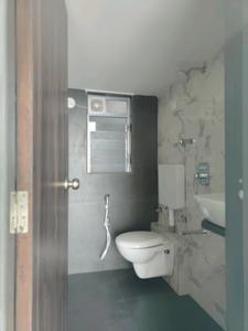 Common Bathroom Image of 1200 Sq.ft 3 BHK Apartment / Flat for sale in Mansarovar Ariana, Vasai West Vasai for Rs. 8500000
