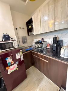 Kitchen Image of 550 Sq.ft 1 BHK Builder Floor for rent in Sector 57 Gurgaon for Rs. 40000