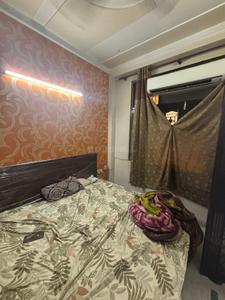 Bedroom Image of 600 Sq.ft 2 BHK Builder Floor for rent in Sector 4 Rohini New Delhi for Rs. 25000