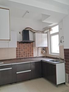 Kitchen Image of 949 Sq.ft 2 BHK Apartment / Flat for sale in Amrapali Zodiac, Sector 120 Noida for Rs. 8900000