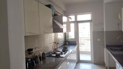 Kitchen Image of 1899 Sq.ft 3 BHK Apartment / Flat for sale in Emaar Palm Gardens, Sector 83 Gurgaon for Rs. 24800000