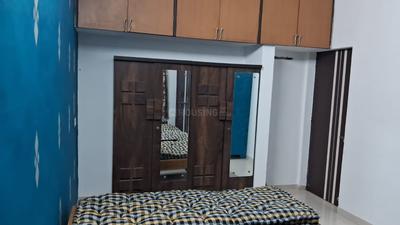 Bedroom Image of Laksmi pg  in Ramdev Nagar, Ahmedabad