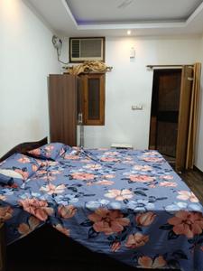 Bedroom Image of 500 Sq.ft 1 RK Independent House for rent in Alaknanda New Delhi for Rs. 19000
