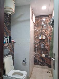 Common Bathroom Image of 990 Sq.ft 2 BHK Builder Floor for rent in Mansarover Garden New Delhi for Rs. 40000