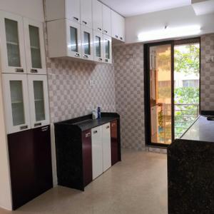Kitchen Image of 980 Sq.ft 2 BHK Apartment / Flat for sale in RDC Woods Teakwood, Kasarvadavali Thane for Rs. 11500000