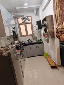 Kitchen Image of 602 Sq.ft 2 BHK Apartment / Flat for rent in Pareena Om Apartments, Sector 112 Gurgaon for Rs. 35000