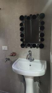 Bathroom Image of 585 Sq.ft 1 BHK Apartment / Flat for sale in Aditya Urban Homes Phase 1A, Bamheta Village Ghaziabad for Rs. 3600000