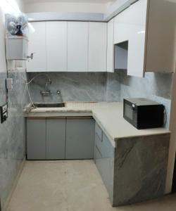 Kitchen Image of 450 Sq.ft 1 BHK Builder Floor for rent in Tilak Nagar New Delhi for Rs. 20000