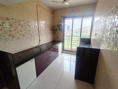 Kitchen Image of 700 Sq.ft 1 BHK Apartment / Flat for sale in Thakurli Thane for Rs. 4600000