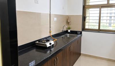 Kitchen Image of 815 Sq.ft 2 BHK Apartment / Flat for rent in ACME Ozone, Thane West Thane for Rs. 38000