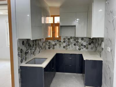 Kitchen Image of 950 Sq.ft 3 BHK Builder Floor for rent in Dream Luxury Homes, Mahavir Enclave New Delhi for Rs. 27000