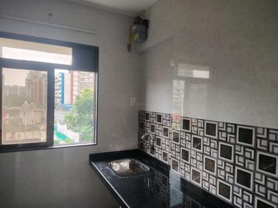 Kitchen Image of 750 Sq.ft 2 BHK Apartment / Flat for rent in Puraniks City Reserva Phase 1, Kasarvadavali Thane for Rs. 21620