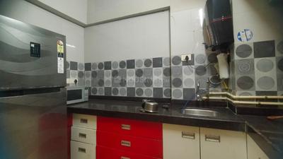Kitchen Image of 1350 Sq.ft 2 BHK Apartment / Flat for rent in Sandhya Co Operative Housing Society Limited, Kopar Khairane Navi Mumbai for Rs. 50000
