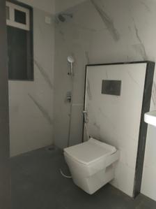 Common Bathroom Image of 950 Sq.ft 2 BHK Apartment / Flat for sale in Nicco Residency, Andheri East Mumbai for Rs. 22700000