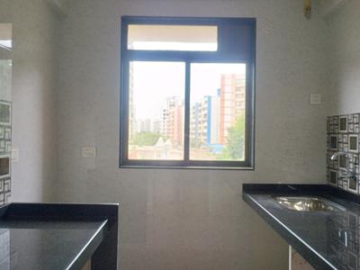 Kitchen Image of 690 Sq.ft 1 BHK Apartment / Flat for sale in Deep Nirvana, Kalyan East Kalyan for Rs. 5500000