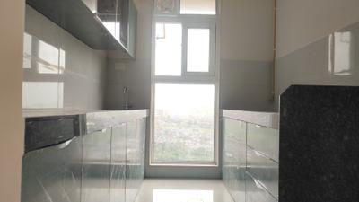 Kitchen Image of 700 Sq.ft 1 BHK Apartment / Flat for rent in Ashar Arize, Kalwa Thane for Rs. 27000