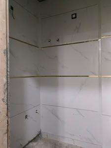 Common Bathroom Image of 550 Sq.ft 2 BHK Apartment / Flat for sale in Fairdeal Burari Dream Homes, Burari New Delhi for Rs. 3500000