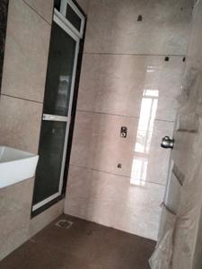 Common Bathroom Image of 700 Sq.ft 1 BHK Apartment / Flat for sale in Niharika Absolute, Kharghar Navi Mumbai for Rs. 7200000