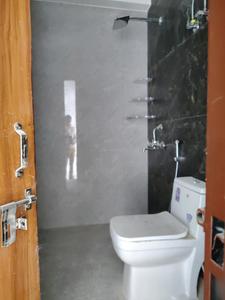 Common Bathroom Image of 500 Sq.ft 1 BHK Builder Floor for rent in Chhattarpur New Delhi for Rs. 16000